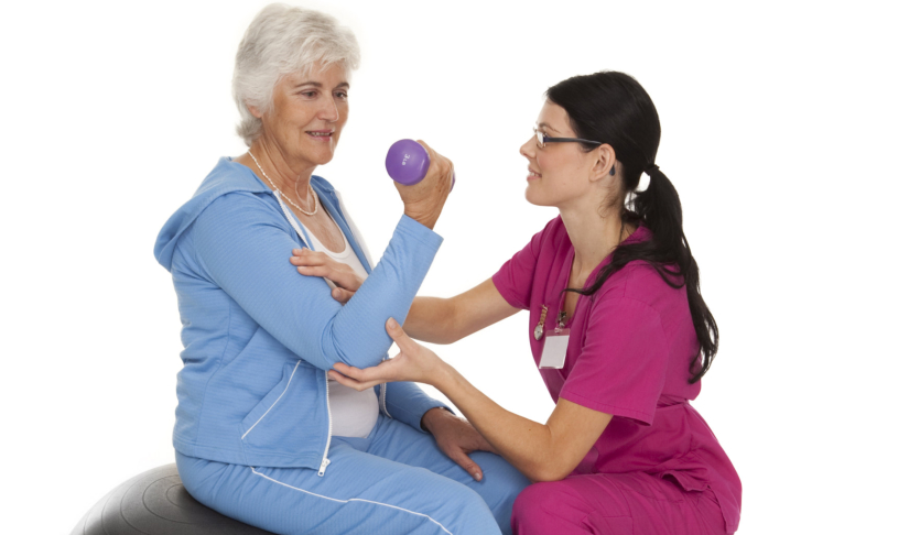 sernior woman having her therapy with her physical therapist